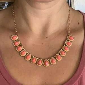 Francesca’s gold tone and coral colored stone statement necklace